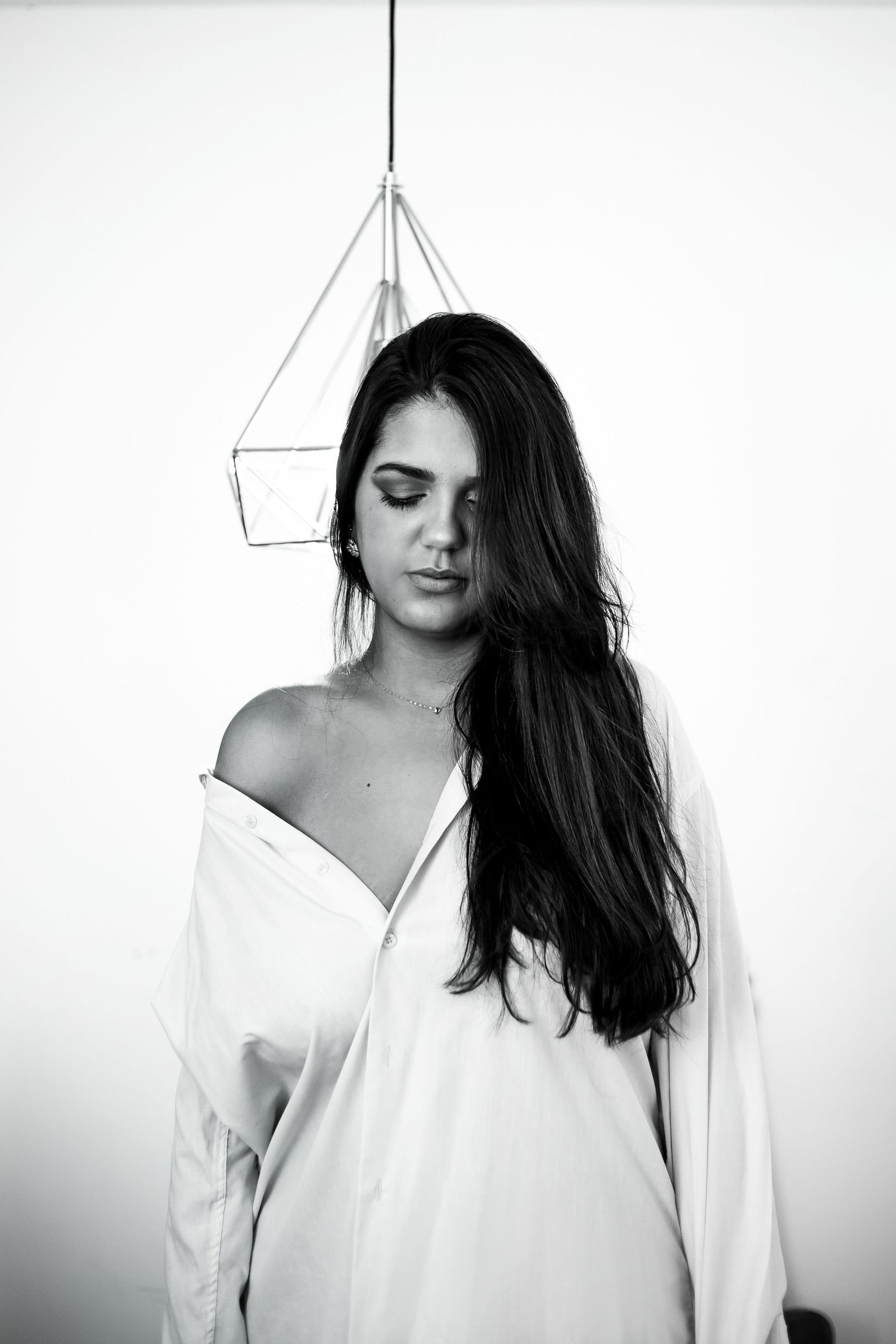 Portrait — off-shoulder white shirt
